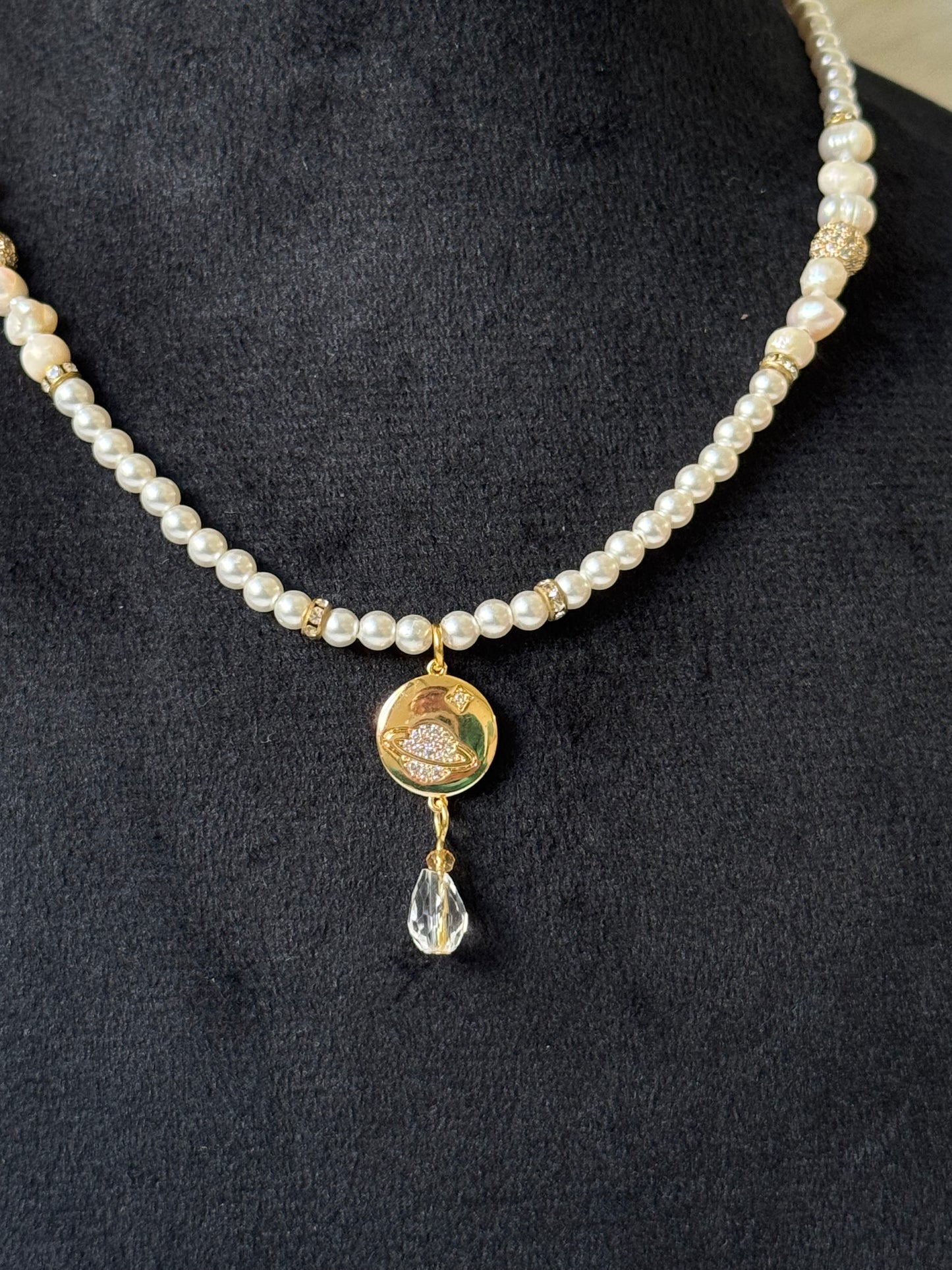 Saturn necklace with pearls