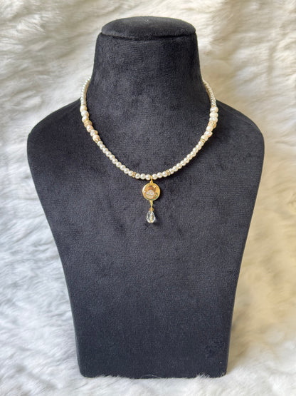 Saturn necklace with pearls