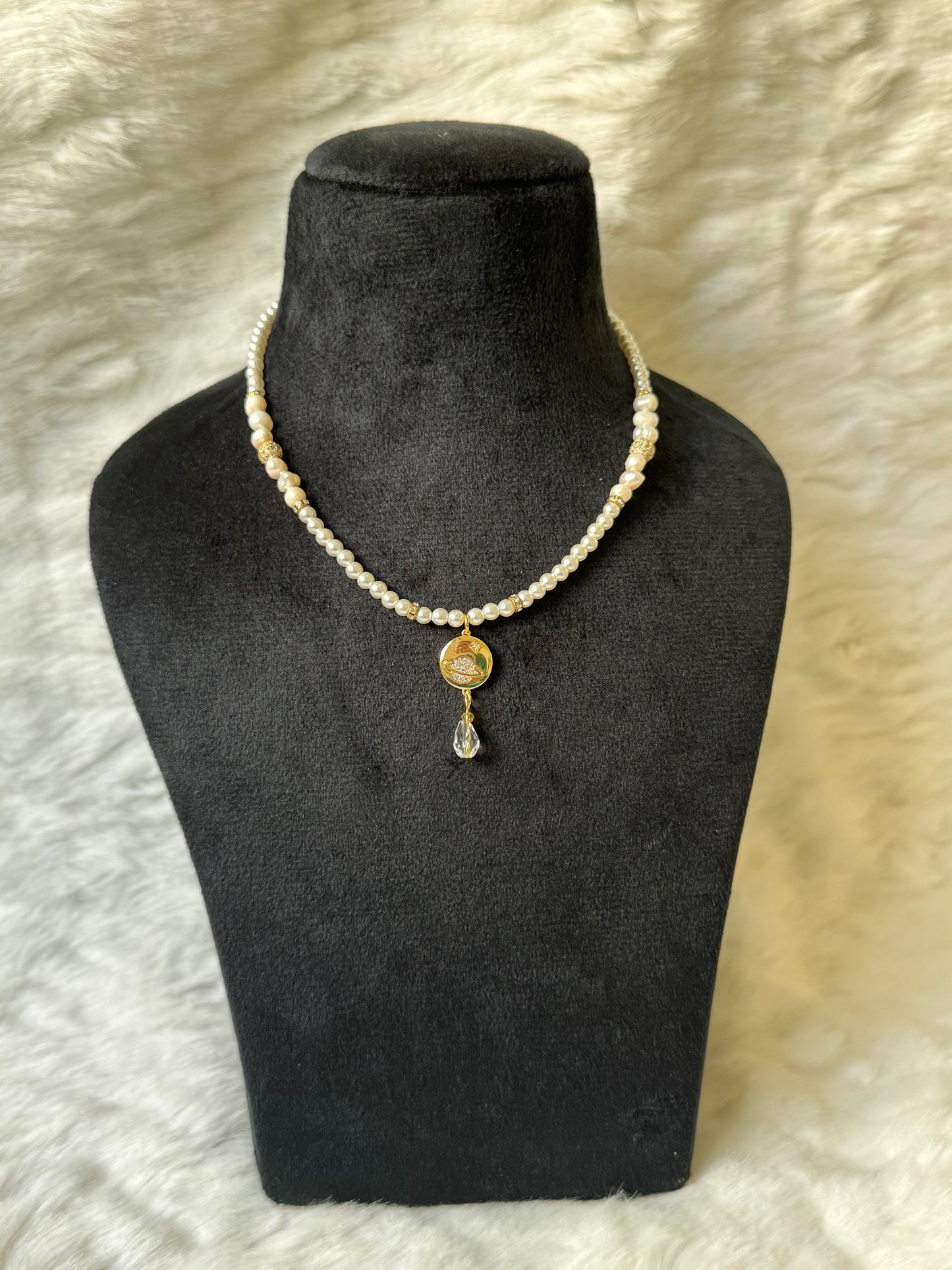 Saturn necklace with pearls